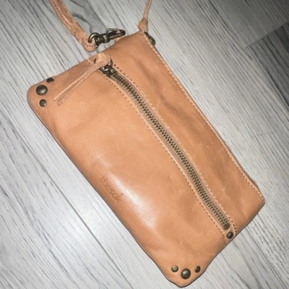 The Sak Women’s Brown Wristlet Wallet Solid Zip Strap with power bank